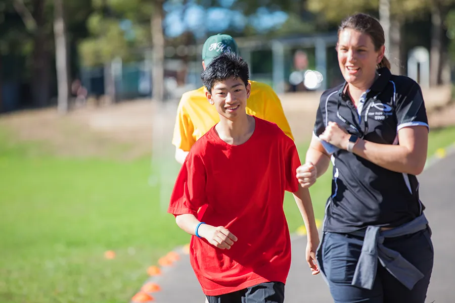 Students enjoying the fun run with teachers
